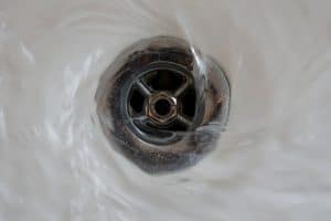 Clear Drain Cleaning Drain with Water
